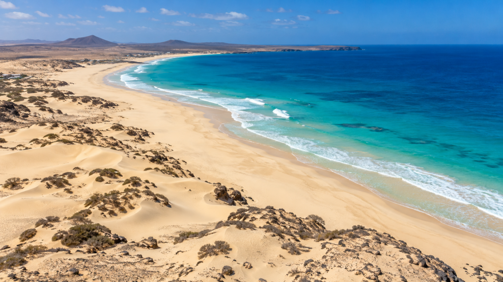 Aerial view of Praia de Chaves in Boa Vista, Cape Verde, with sand dunes and turquoise Atlantic water